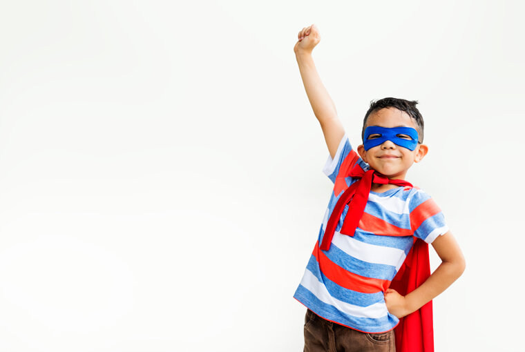 little-boy-playing-superhero-at-the-playground