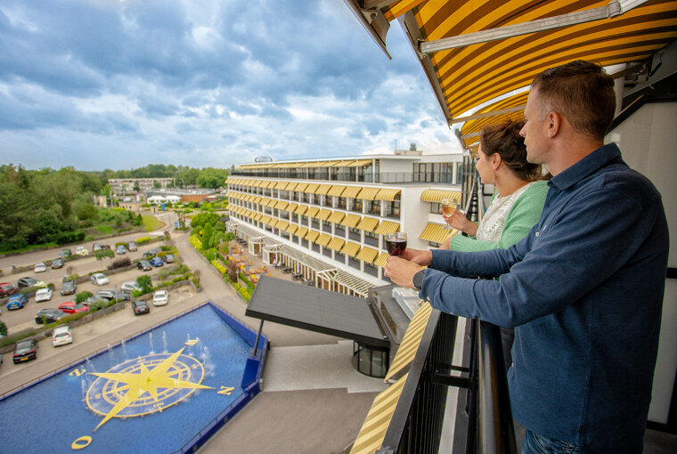 Balkon met drankje